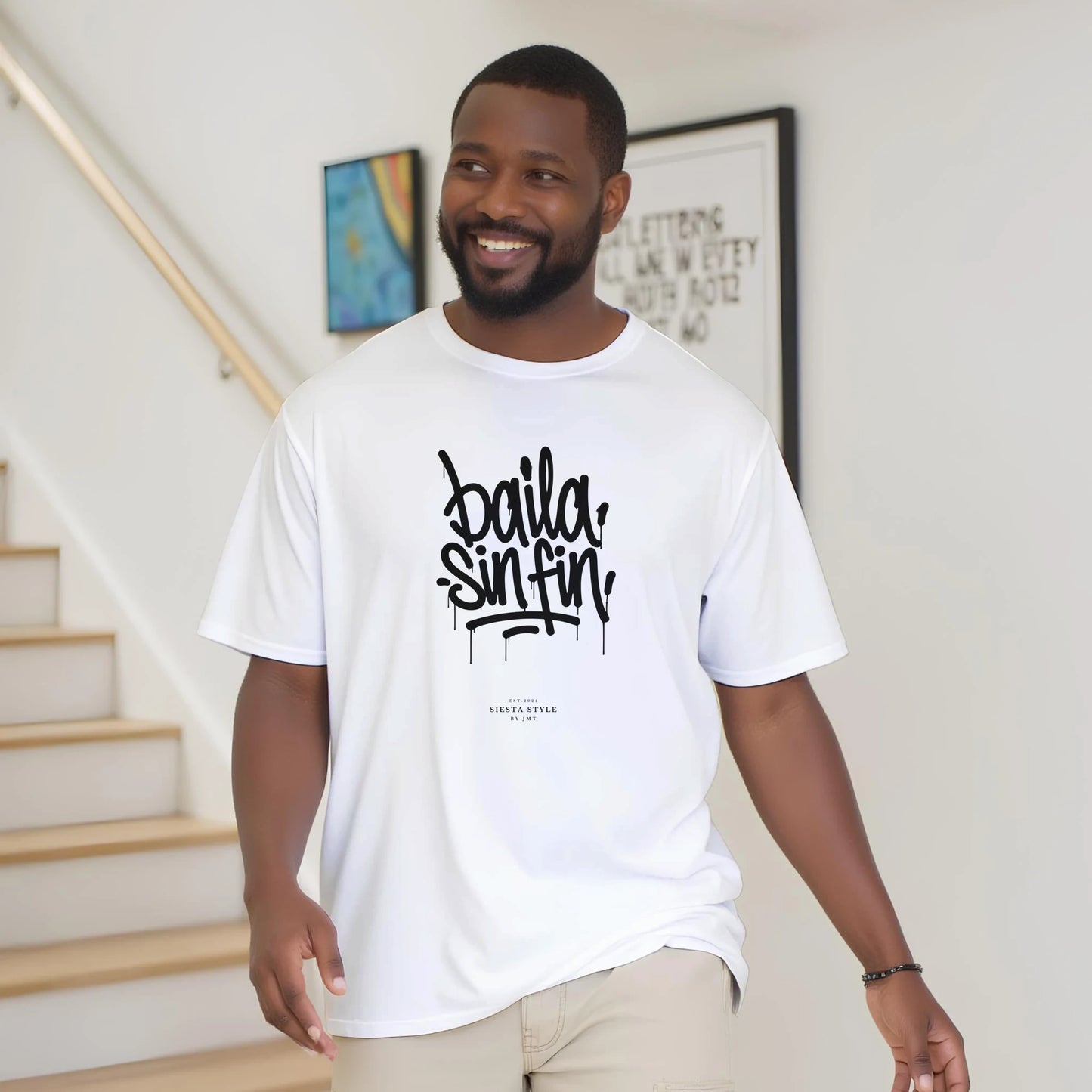 White travel t-shirt with “Baila sin fin” Spanish typography design men