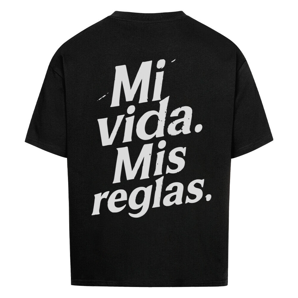 Black oversized t-shirt with “Mi vida. Mis reglas.” typography print, back view
