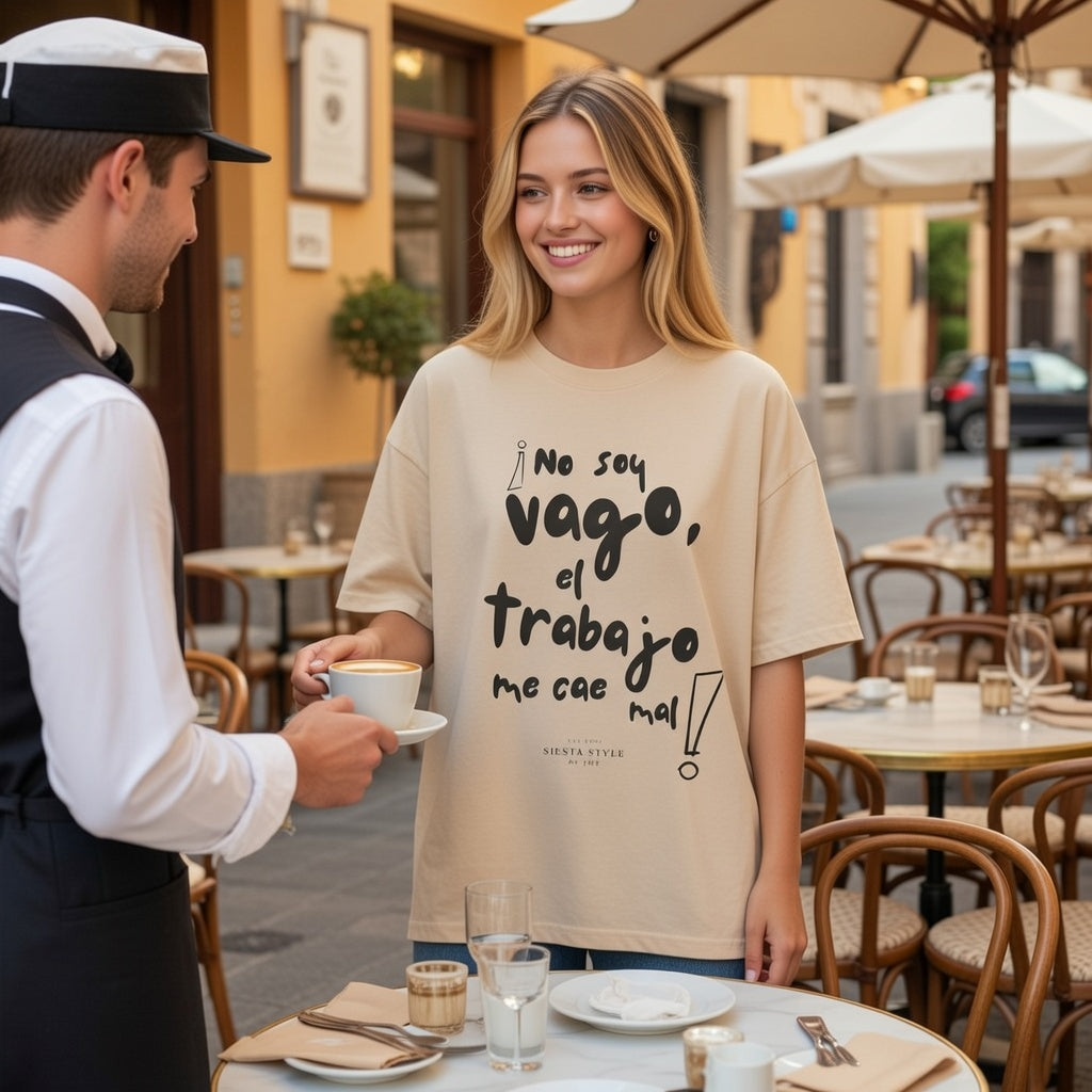 Model wearing beige unisex T-shirt with Spanish text print, front view