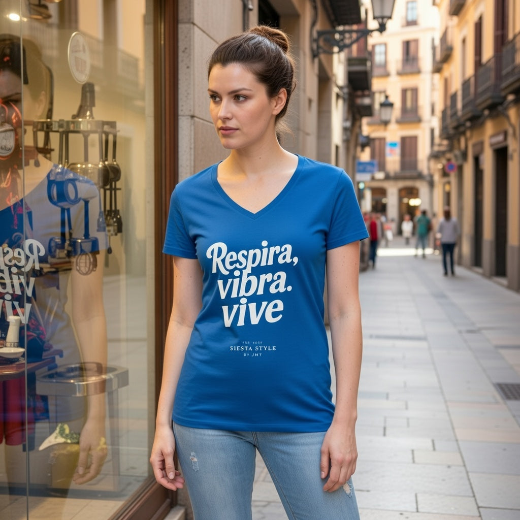 Model wearing saphire V neck T-shirt with "Respira,vibra,vive" print